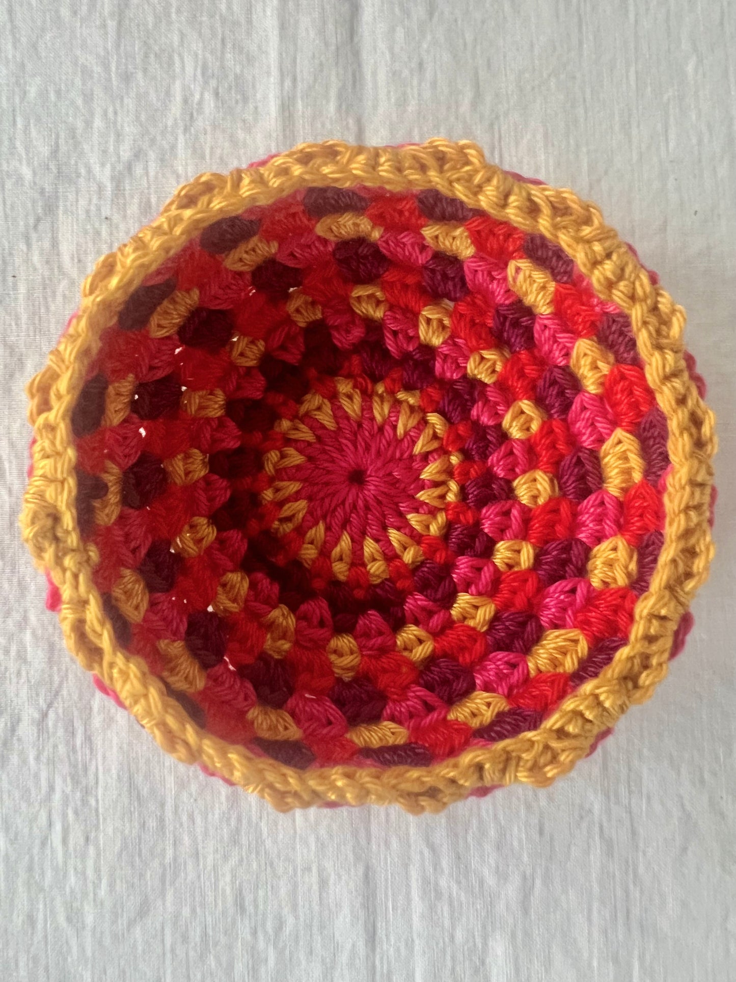 Crochet Art Bowls, pink rim is sold. Choose purple or yellow.