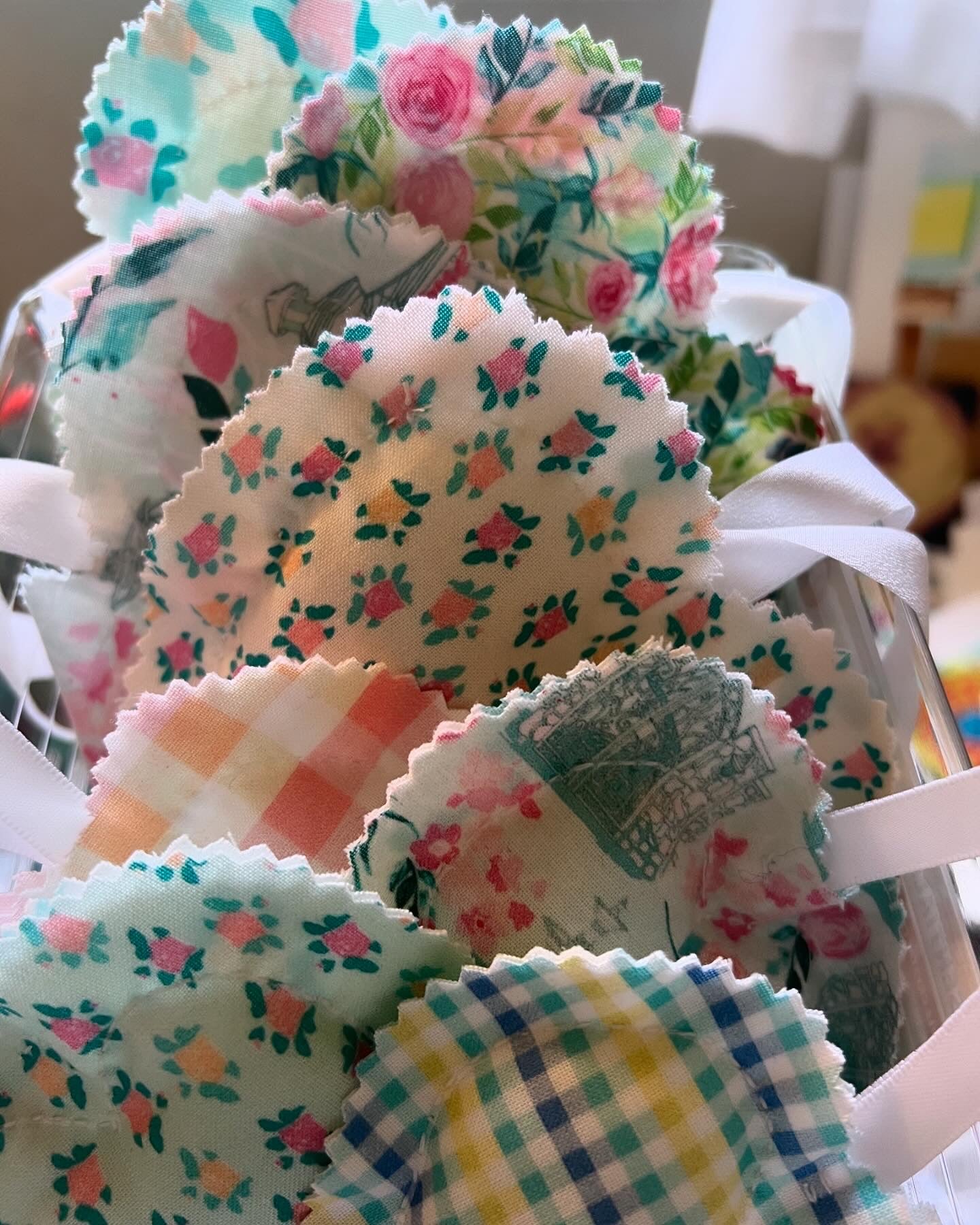 Eight handstitched soft hearts in assorted print fabric stuffed with poly fiber.