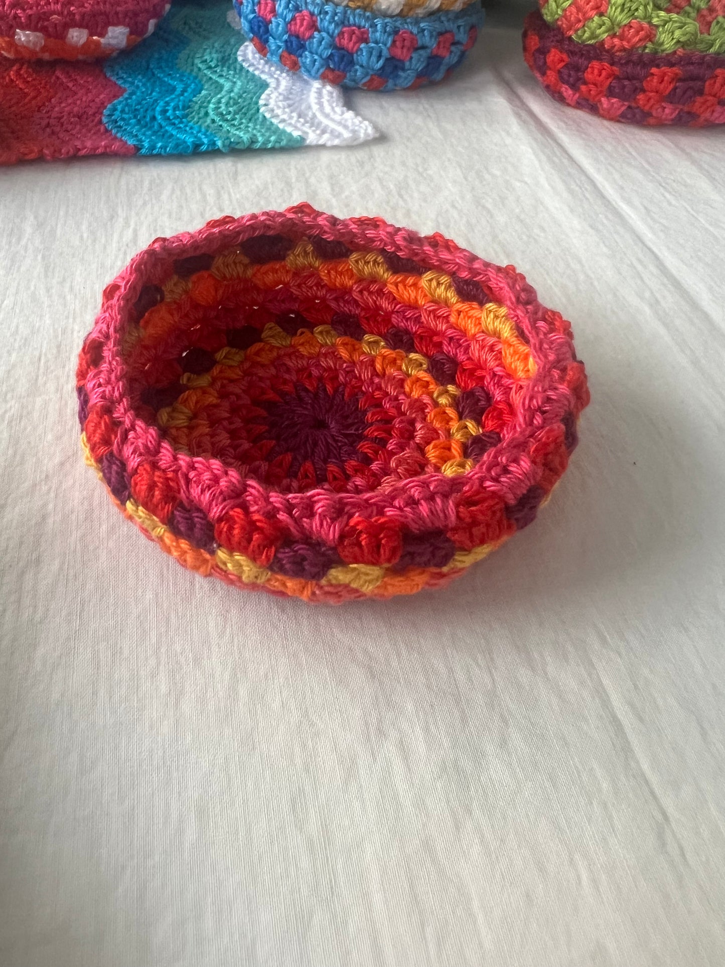 Crochet Art Bowls, pink rim is sold. Choose purple or yellow.