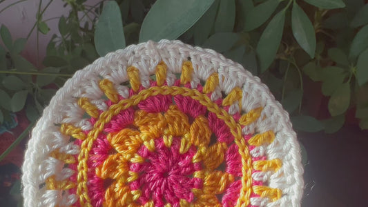 Crochet mini mandala art coasters in lemon, creme, strawberry, and mango. (See two options: full set of 4, as shown and priced; Or, see the Pick 2 offering.)